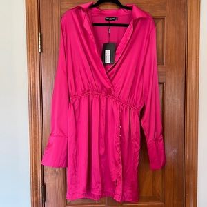 NWT. Pretty little thing, hot pink mini dress. Small slit. Long sleeve.
